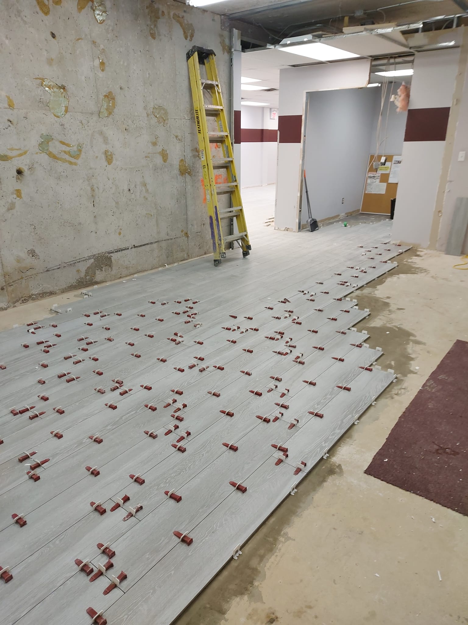 Basement floor tile installation